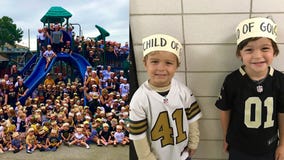 Students wear 'Child of God' headbands in support of New Orleans Saints' Demario Davis