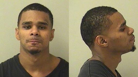 Aurora man charged with armed robbery