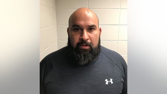 Corrections officer charged with stealing $20K in unworked overtime