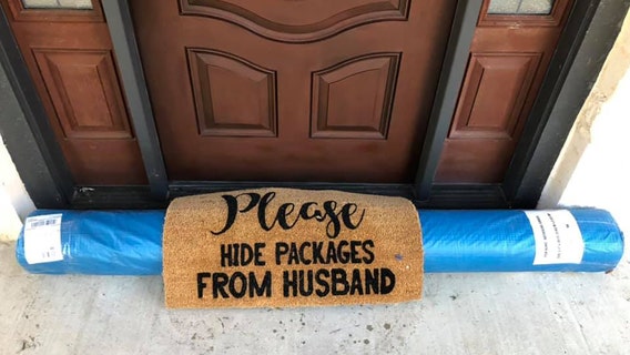 UPS driver 'hides' large package under doormat