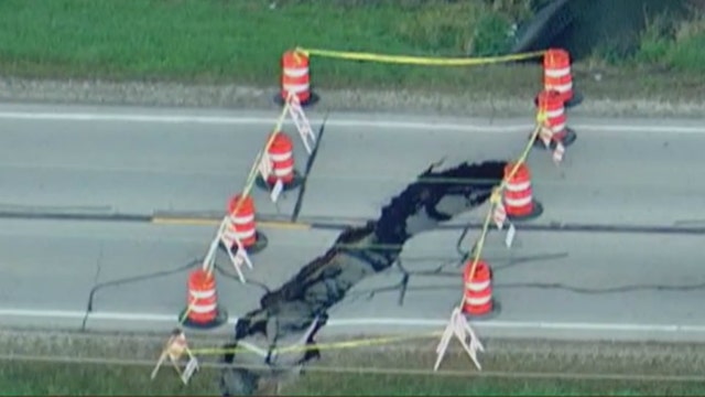 Sinkhole swallows part of road in New Lenox
