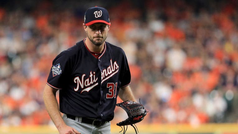 HOUSTON, TEXAS - OCTOBER 22: Max Scherzer #31 of the Washington Nationals reacts after retiring the side in the fifth inning against the Houston Astros in Game One of the 2019 World Series at Minute Maid Park on October 22, 2019 in Houston, Texas. (Photo by Mike Ehrmann/Getty Images)