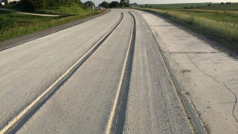 bbb20035-Car drives through concrete