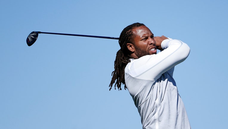 af545cd9-GETTY Larry Fitzgerald Playing Golf 011819-408200
