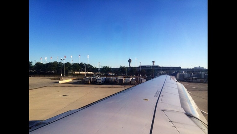 31ca5380-ohare-airport-airplane-wing