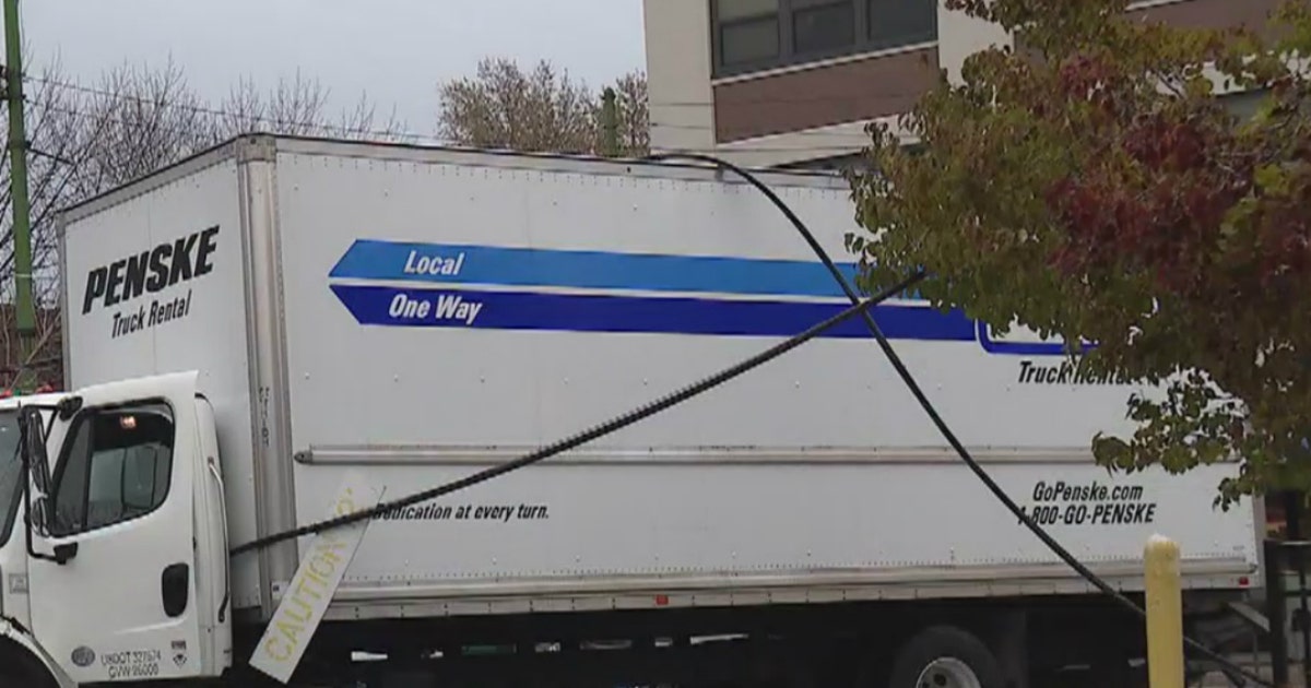 Electrical pole falls on car after truck snags power lines in Lincoln ...