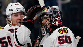 Crawford, Blackhawks win 5-3 for 1st victory over Las Vegas