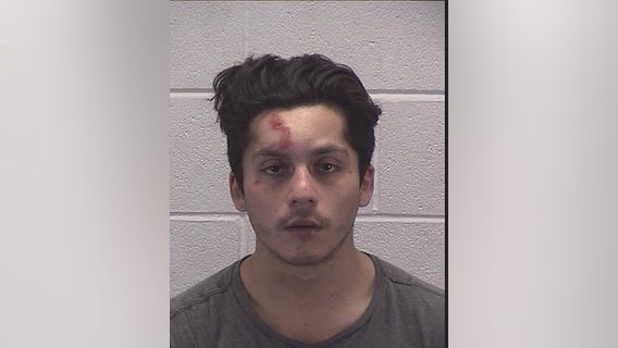 Man charged with DUI in crash with Aurora police car