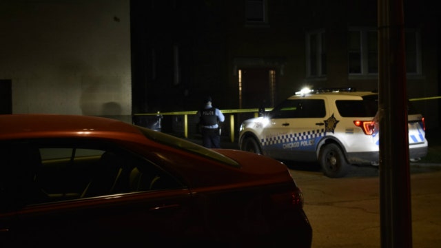 Woman shot while sitting in vehicle in Austin