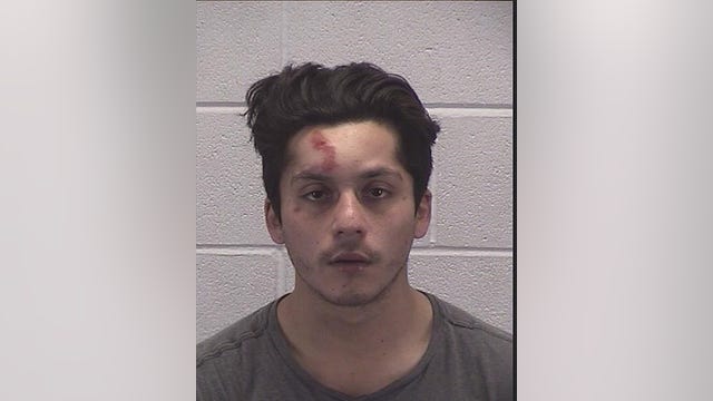 Man charged with DUI in crash with Aurora police car