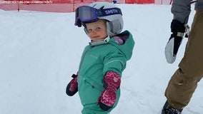 Baby shreds snow on Utah ski slopes