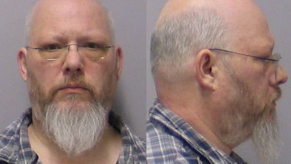 Man charged with bringing child porn to work in suburban Chicago