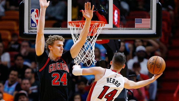 Bulls player Lauri Markkanen faces Tyler Herro of the Miami Heat