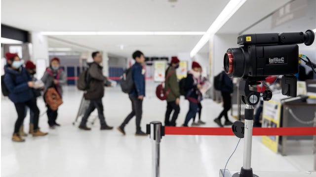 Virus cases in China jumps to 5,974, surpassing SARS as evacuations begin