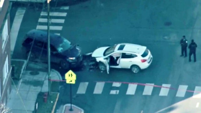 Man crashes into CPD vehicle after being shot in Englewood