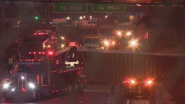 Dan Ryan local lanes reopen after truck overturns, spills trash near Skyway