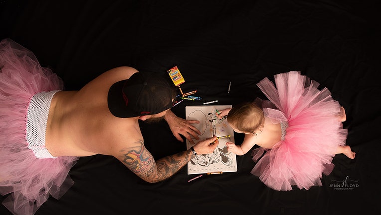 Casey and Lyla captured coloring in a daddy-daughter photoshoot.