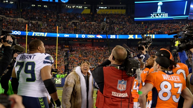 From Joe Namath's fur coat to President Reagan's throw via satellite, these are the most iconic Super Bowl coin toss moments