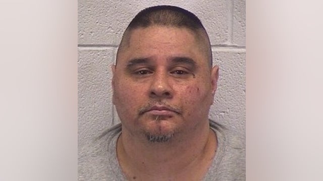 Man accused of shooting at police car in Aurora