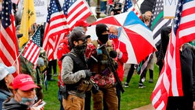 Armed Michigan protesters storm state Capitol in opposition to stay-at-home order