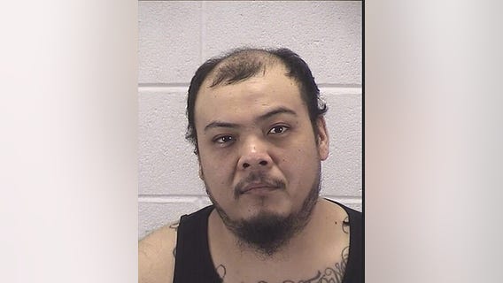 Man charged with shooting at vehicle in Aurora