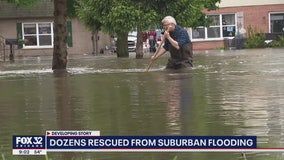 Dozens rescued from suburban flooding after record-setting rainfall