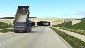 Shocking Video: Dump truck with bed in the air strikes bridge