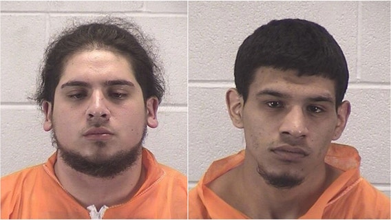 2 charged with arson in suburban Aurora