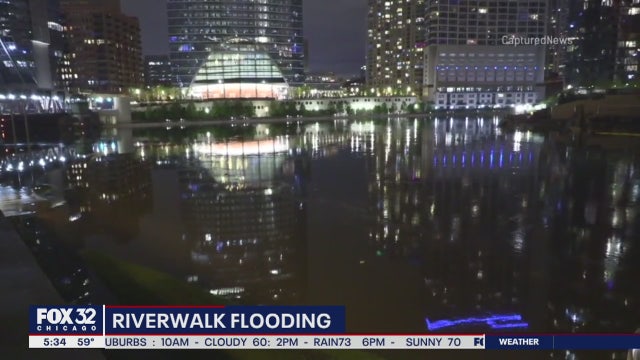 Day of rain leaves Chicago River surging, roads flooding