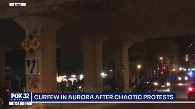 Bank in Aurora on fire, hundreds of protesters downtown as police try to enforce curfew