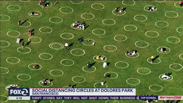 Social distancing circles dot San Francisco's Dolores Park