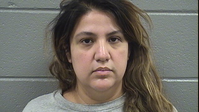 Woman charged with knife attack of 2 Chicago cops at Avondale fire