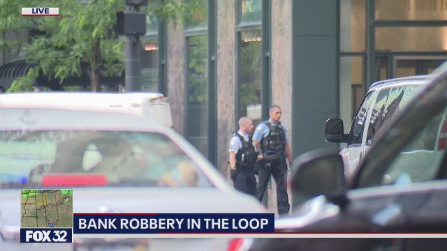 SWAT team responds to Loop bank robbery; suspect in custody