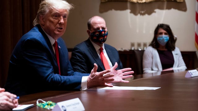 Health and Human Services director says Trump doesn't have to wear a mask, but the rest of us should