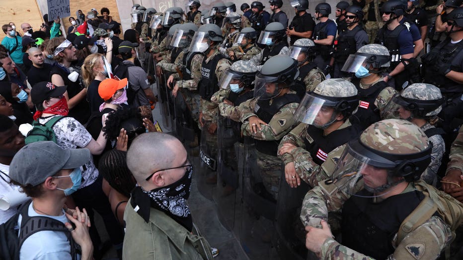 e6c69465-Protesters Demonstrate In D.C. Against Death Of George Floyd By Police Officer In Minneapolis