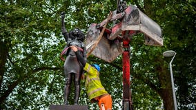 Black UK protester statue removed from pedestal in UK