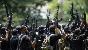 Armed Black activists demand justice for Breonna Taylor