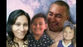 Family of 4 killed, 2 children survive crash with semi