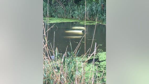 Empty car found submerged in South Deering drainage ditch
