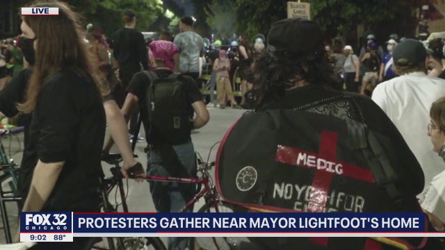 Protesters gather near Chicago Mayor Lori Lightfoot's house Saturday night