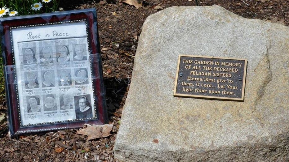 A-small-memorial-to-the-12-sisters-who-died-in-one-month-from-COVID-19-sits-in-the-gardens-outside-the-Felician-Sisters-convent-in-Livonia-Mich..jpg