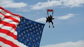 Double-amputee veteran skydives above Sturgis rally with giant US flag, Trump 2020 parachute