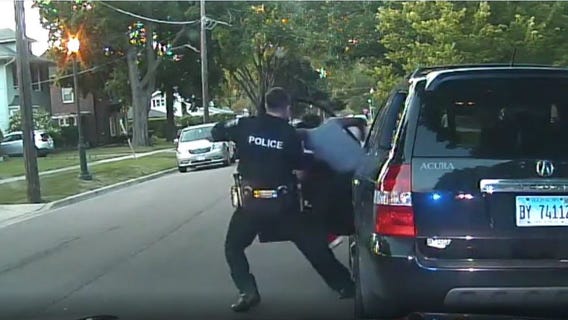 Aurora police release video of officer pulling woman from car in traffic stop