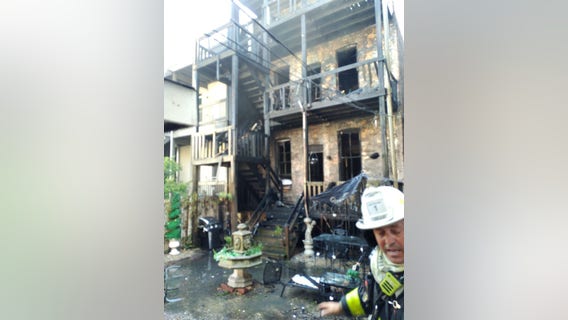 Old Town porch fire spreads into home, causing heavy damage, injuring firefighter