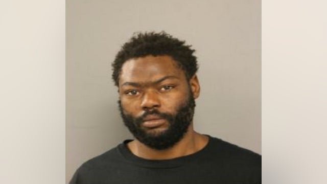 Man charged in Ogden Park Post Office looting still at large: officials