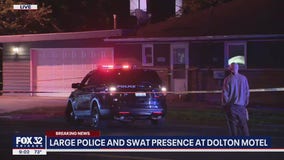 Woman, 4-year-old held hostage at south suburban motel, suspect now in custody