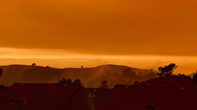 Wildfires cast eerie orange shade over Bay Area skies