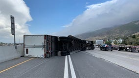 Hurricane-force winds blow over dozens of semi-trucks in Utah