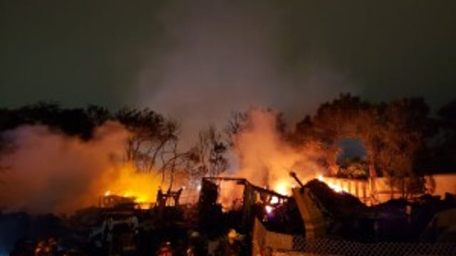 Crews battle 2-alarm fire at Austin scrap yard