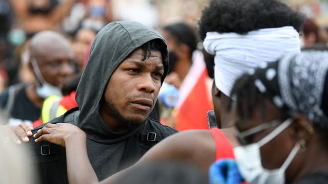 Perfume company apologizes to actor John Boyega after cutting him out of ad he helped create